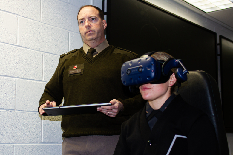 West Point became the first Department of Defense entity to onboard a first-of-its-kind, immersive Analytics Engine onto the U.S. Military Academy’s three Aviation Training Next (ATN) Systems. Lt. Col. James Schreiner, the director of the Engineering Management (EM) Program for the Department of Systems Engineering at West Point, demonstrates the latest technological advancements with the help of a cadet.     (Photo by Jorge Garcia/PV)