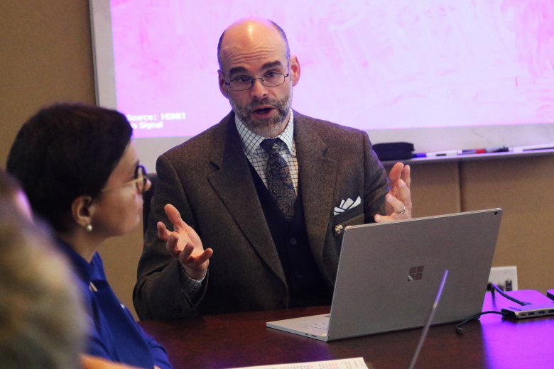 Dr. Rob Person, an associate professor of International Relations and director of curriculum, International Affairs program, at West Point speaks to the group during the “Russian Asymmetric Strategies of Dis-Ordering” panel Feb. 9 at Jefferson Hall.  (Photo by Eric S. Bartelt/PV)