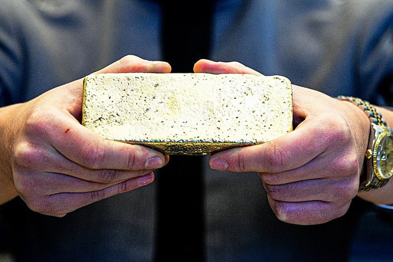 After the annual Ring Melt, hosted by the West Point Association of Graduates, Class of 2023 Cadet Lucas Semon, the Ring and Crest Committee deputy chairperson for U.S. Military Academy Class of 2023, holds the gold ingot of the 71 donated rings and the Legacy Gold on Friday at Eisenhower Hall Theatre.