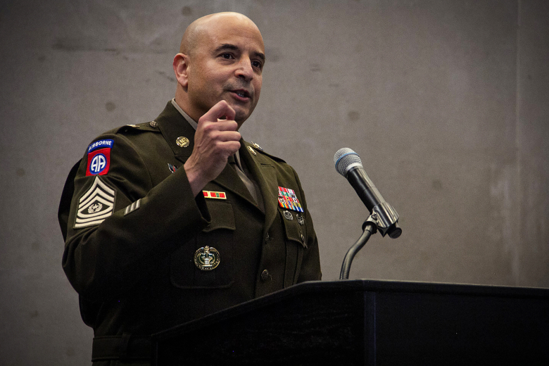 The 26th U.S. Corps of Cadets command sergeant major, Command Sgt. Maj. Robert Craven, gives a speech during his assumption of responsibility ceremony on Friday at Crest Hall.