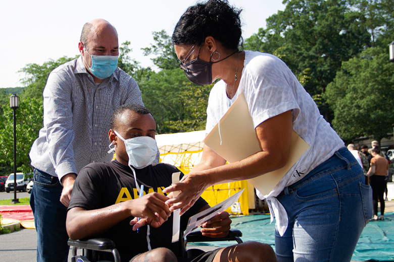 There were varying degrees of hypothetical injuries that medical practitioners assessed during the drill. There were 25 community members who volunteered as role players (left) and served as an integral part of the exercise.