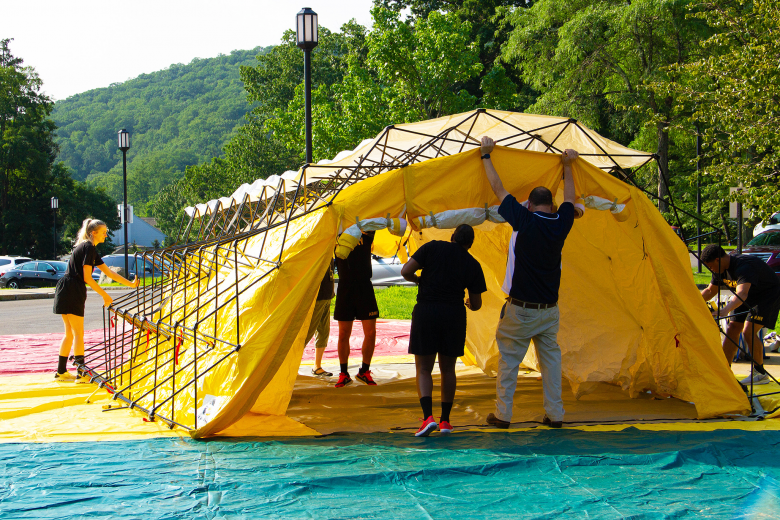 Cadets and staff members from Keller Army Community Hospital set up four triage tents during the mass casualty/decontamination exercise on July 22 at the U.S. Military Academy.