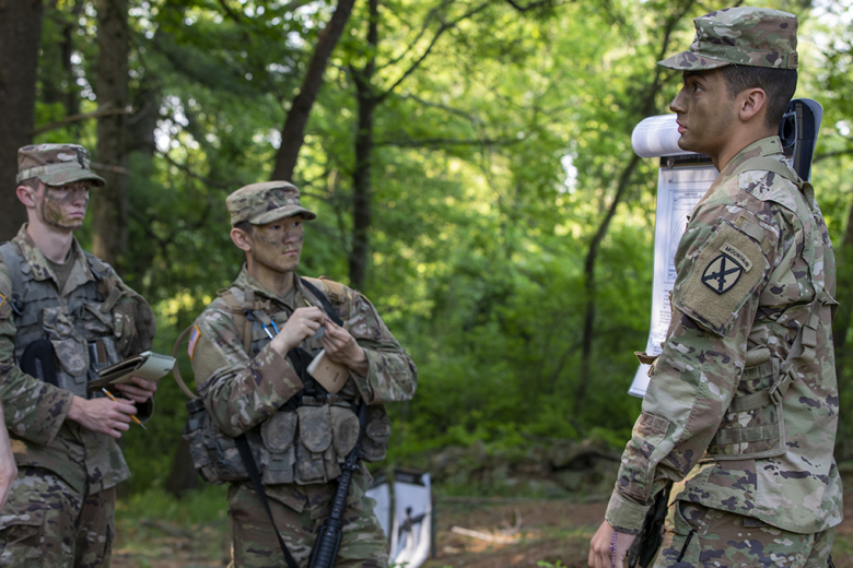 Cadets from Cadet Field Training 8th Company at the U.S. Military Academy practice their warrior tasks and battle drills during Cadet Summer Training at West Point May 26. Cadets practiced utilizing camouflage, as well as a variety of weapon systems. The 2nd Brigade Combat Team, 10th Mountain Division Task Force Soldiers helped the CFT cadet cadre during the training. 