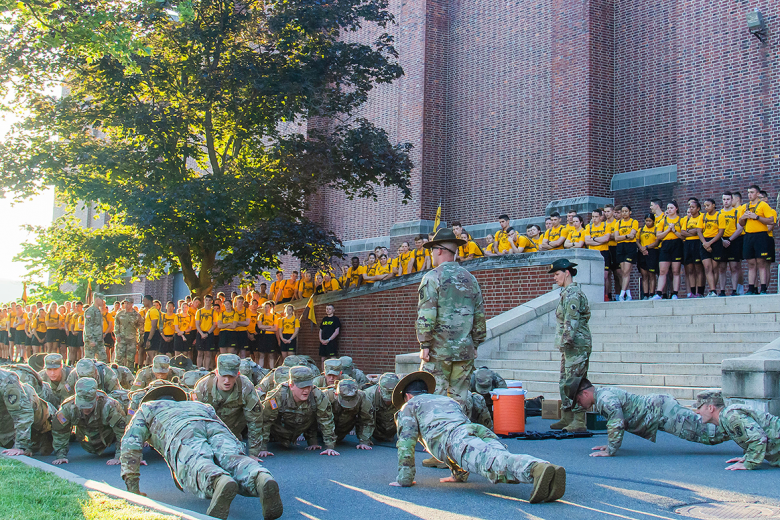 A through F Companies of Cadet Basic Training I detail assembled on the Gillis Field House steps and ramps June 18 to provide inspiration to the CBT cadet cadre platoon who were ordered by the drill sergeants to stop and perform a series of exercises meant to instill discipline and underscore the importance of situational awareness as they perform their duties on the battlefield.  
