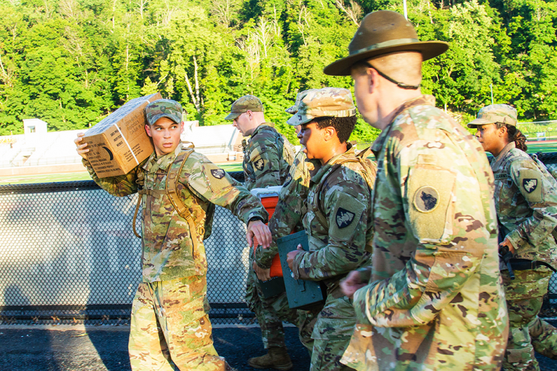 Cadet cadre from the Cadet Basic Training I detail run to Shea Stadium while carrying equipment as they come close to covering the “First 100 Yards” on June 18 at West Point. Drill sergeants from the 198th Infantry Training Brigade One Station Unit Training (OSUT) at Fort Benning, Ga., motivate them on the run.