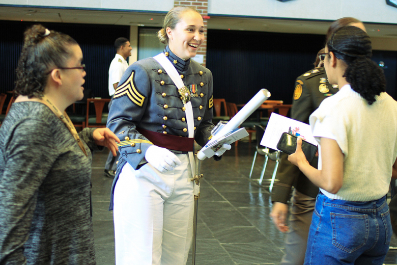 Family and friends gathered at Eisenhower Hall to celebrate the triumph of (above from left to right) Class of 2022 Cadets Brooke Allen, Shelby Rotchford and Matthew Schirmer as they graduated and commissioned as second lieutenants on June 10 at the U.S. Military Academy.          (Photo by Jorge Garcia/PV)