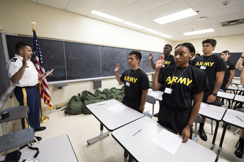 New cadets from the Class of 2026 take their oath during Reception Day Monday in Thayer Hall.   		(Photo by John Pellino/USMA PAO)