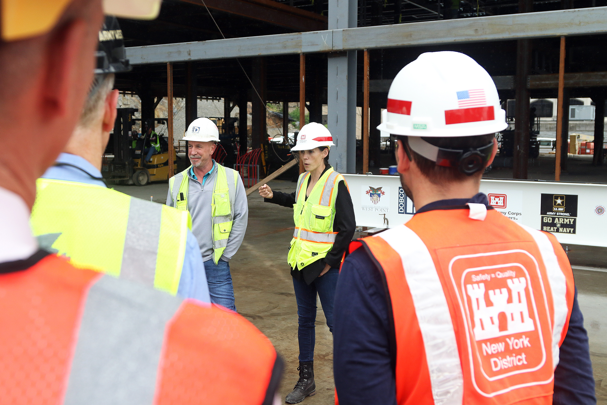One of the final beams was placed on top of the future Cyber and Engineering Academic Center (CEAC) during a ceremony June 22 at the U.S. Military Academy. Traditionally, a beam topping ceremony is the celebration of the last beam placed on the building and marks a major milestone in the construction process of that building.  (Photo by Eric S. Bartelt/PV)