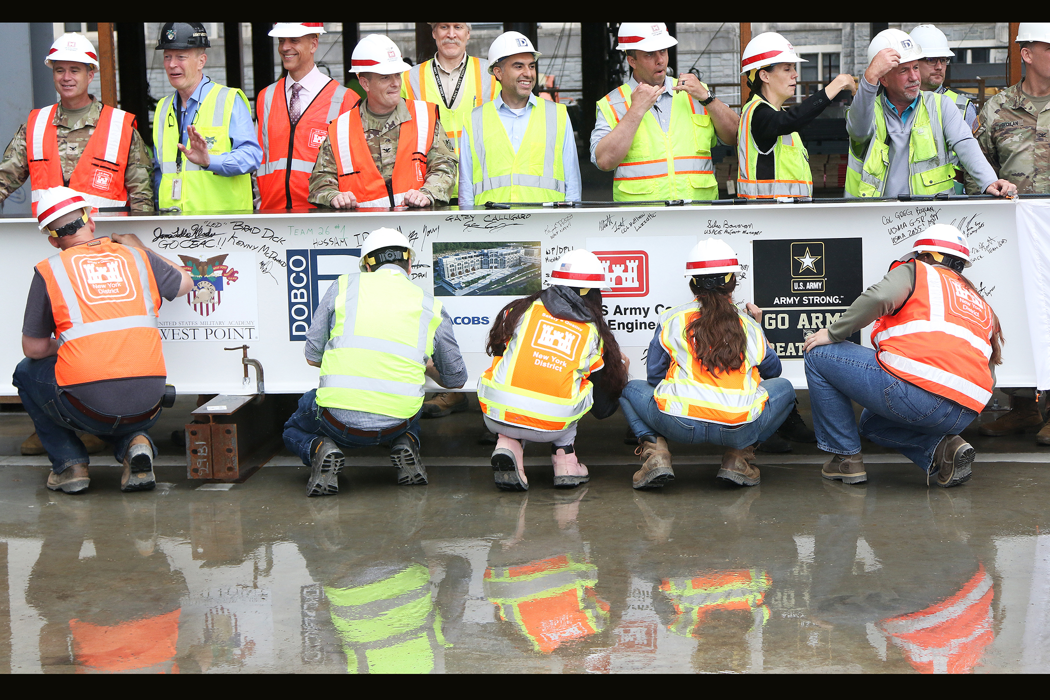 One of the final beams was placed on top of the future Cyber and Engineering Academic Center (CEAC) during a ceremony June 22 at the U.S. Military Academy. Traditionally, a beam topping ceremony is the celebration of the last beam placed on the building and marks a major milestone in the construction process of that building.  (Photo by Eric S. Bartelt/PV)