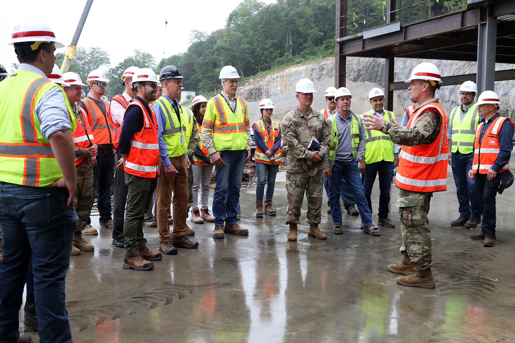One of the final beams was placed on top of the future Cyber and Engineering Academic Center (CEAC) during a ceremony June 22 at the U.S. Military Academy. Traditionally, a beam topping ceremony is the celebration of the last beam placed on the building and marks a major milestone in the construction process of that building.  (Photo by Eric S. Bartelt/PV)