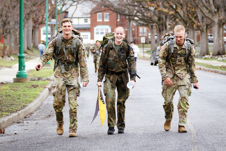 A few hundred runners and ruck marchers competed in the sixth annual Fallen Comrades Half Marathon, hosted by the Army West Point marathon team, Sunday at West Point. The event commemorates graduates who have passed since 2001 during the Global War on Terrorism (bottom center photo). The top runners and ruck marchers of the day were first-place overall and male runner, Class of 2023 Cadet Zack Gould (above photo), who finished in 1:17:10 (5:53 min/mile), and the first-place female runner, Madison Armonda,