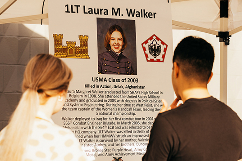 A few hundred runners and ruck marchers competed in the sixth annual Fallen Comrades Half Marathon, hosted by the Army West Point marathon team, Sunday at West Point. The event commemorates graduates who have passed since 2001 during the Global War on Terrorism (bottom center photo). The top runners and ruck marchers of the day were first-place overall and male runner, Class of 2023 Cadet Zack Gould (above photo), who finished in 1:17:10 (5:53 min/mile), and the first-place female runner, Madison Armonda, f