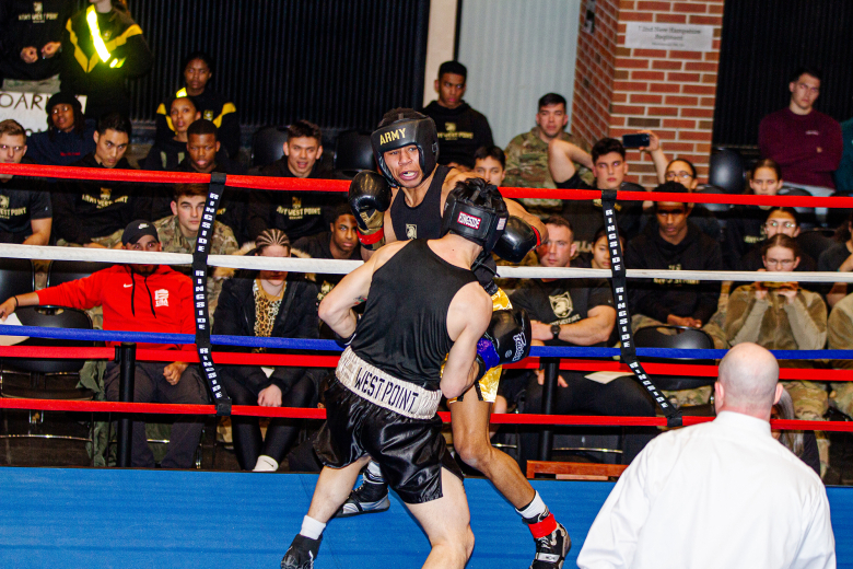 Cadets, staff and faculty rallied in droves at Eisenhower Hall to watch cadets from the Army West Point boxing team and Corps of Cadets compete against one another in a no holds barred match, showcasing their boxing acumen during the 67th annual Army West Point Brigade Boxing Open Finals Feb. 24 at the U.S. Military Academy. The evening's highlights included nine action-packed bouts representing 14 companies across the Corps of Cadets. The winners advanced to the National Collegiate Boxing Association - NCB
