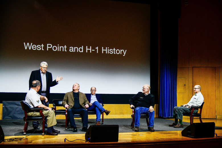 After nearly 50 years, the original Company H-1 guidon was returned to Company H-1 during a ceremony on March 25 at Robinson Auditorium in Thayer Hall. U.S. Naval Academy Midshipmen stole the H-1 guidon and other companies’ guidons during the 1974 Army-Navy Game. While other guidons were later returned, the H-1 guidon remained lost in possession of Midshipmen for 50 years. Former Company H-1 members regained possession of the original guidon by exchanging it for a Company H-1 challenge coin.
