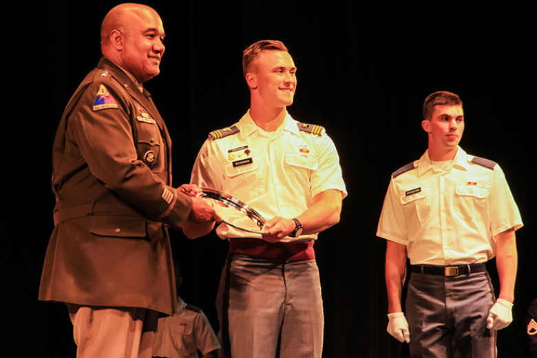 Superintendent Lt. Gen. Darryl A. Williams (left) presents Class of 2021 Justin Gittemeier with one of his multiple silver trays he earned and this one was for the highest class standing. Gittemeier, among receiving other awards, also earned the Brig. Gen. Gerald A. Counts Memorial award for the highest rating in physics.