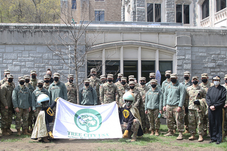 West Point observed a combined Earth Day and Arbor Day celebration April 22. Dirt Man, Dirt Woman and cadets from the Green Team Environmental Club (right and above) assisted in planting a tree in front of the Dental Clinic at Building 606. The Directorate of Public Works Management Agronomist Phil Koury and his team created a space and provided a tree for the planting. Dean of the Academic Board Brig. Gen. Cindy Jebb read an Arbor Day proclamation while cadets, staff and faculty from the Department of 