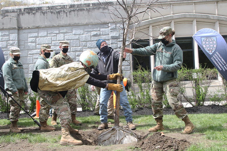 West Point observed a combined Earth Day and Arbor Day celebration April 22. Dirt Man, Dirt Woman and cadets from the Green Team Environmental Club (right and above) assisted in planting a tree in front of the Dental Clinic at Building 606. The Directorate of Public Works Management Agronomist Phil Koury and his team created a space and provided a tree for the planting. Dean of the Academic Board Brig. Gen. Cindy Jebb read an Arbor Day proclamation while cadets, staff and faculty from the Department of 