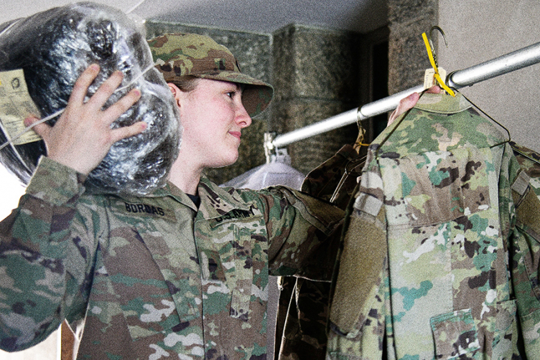Class of 2024 Cadet Lindsey Bordas retrieves a set of uniforms cleaned at the West Point Logistics Readiness Center Cadet Laundry Facility. Cadets utilize this service to help with their laundry needs.