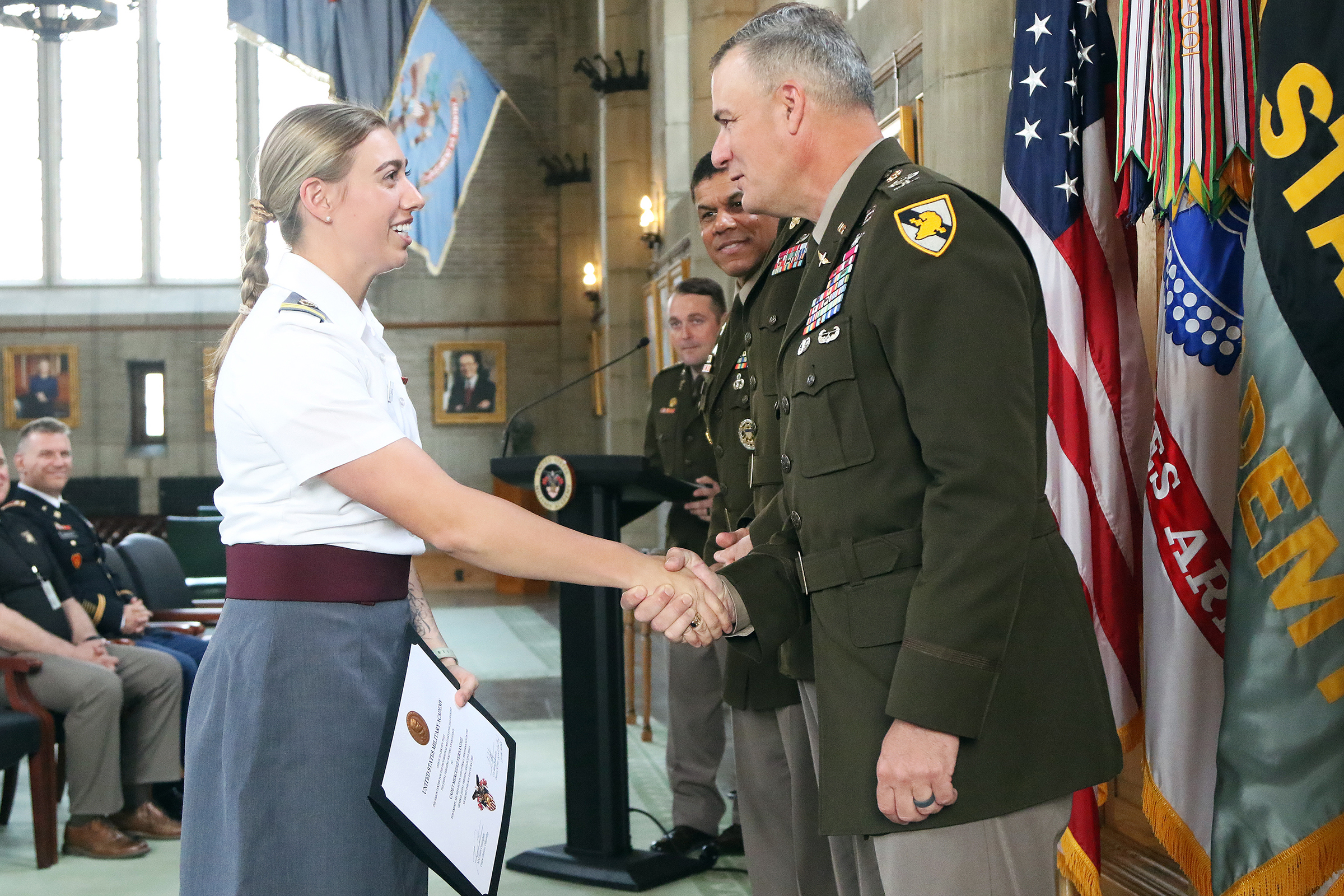 The Simon Center for the Professional Military Ethic (SCPME) hosted the 17th annual Gen. John J. Pershing Writing Award Ceremony May 24 at the Thayer Award Room. The award recognition ceremony acknowledged the top Firstie cadet awardees: Mercedez Fernandez (first place/gold medal), Jacob Lapin (second place/silver medal), Cora Haefner (third place/bronze medal) and honorable mention recipients Kelsie Edie and Anthony Marco III. Honorable mention awardee Shinkwang Moon was not present at the ceremony. 