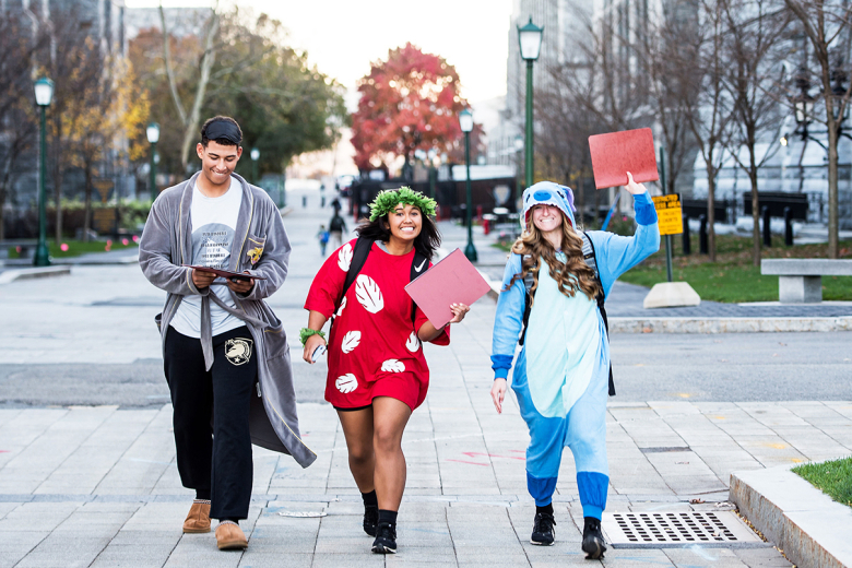 Every semester, U.S. Military Academy cadets continue the tradition of the Social Sciences Run by finding creative, unusual and comedic ways of turning in their SOSH papers when they are due. On Monday, “panic-strickened” costumed cadets dashed, walked, carted, strolled or were carried in a parade of amusement before a cheering crowd of cadets through Central Area to their final destination at Lincoln Hall to meet their deadline. The SOSH paper, which is the signature writing assignment in the required 