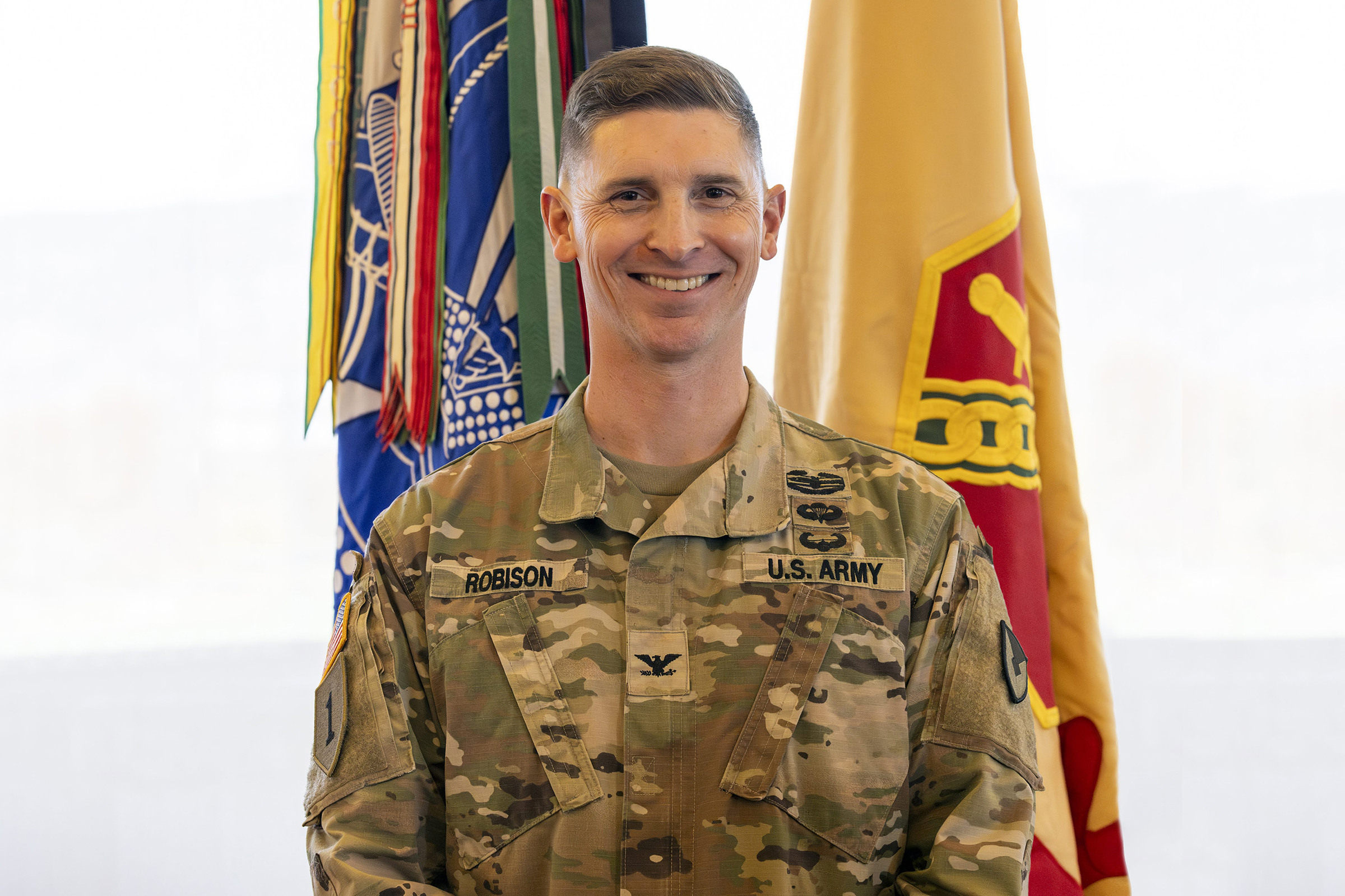 The U.S. Army Garrison West Point and the U.S. Army Installation Management Command (IMCOM) hosted the Assumption of Command ceremony of Col. Travis E. Robison Nov. 15 in the Haig Room in Jefferson Hall. During the ceremony, Robison received the unit guidon to take command from Kathryn E. McNeely, the director (acting) of IMCOM – Training, with Command Sgt. Maj. Michel R. Fraser, Garrison West Point command sergeant major, also a part of the assumption of command unit colors exchange. 