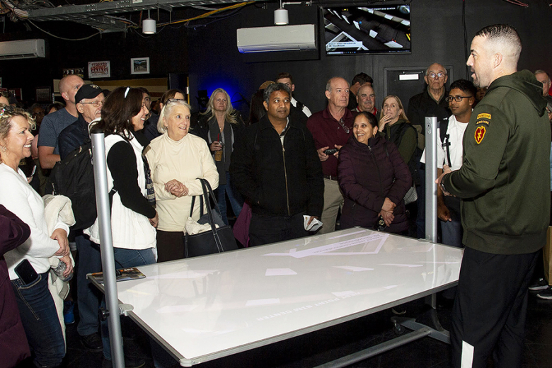 U.S. Military Academy cadets, families and friends attended a dinner function during Family Weekend Friday at the Cadet Mess Hall. Family Weekend provides families and friends an opportunity to spend time with their cadets while participating in a myriad of activities, including the Simulation Center (left), which highlight all aspects of cadet life at the U.S. Military Academy. 				        				   Photos by Elizabeth Woodruff and Kyle Osterhoudt/USMA PAO