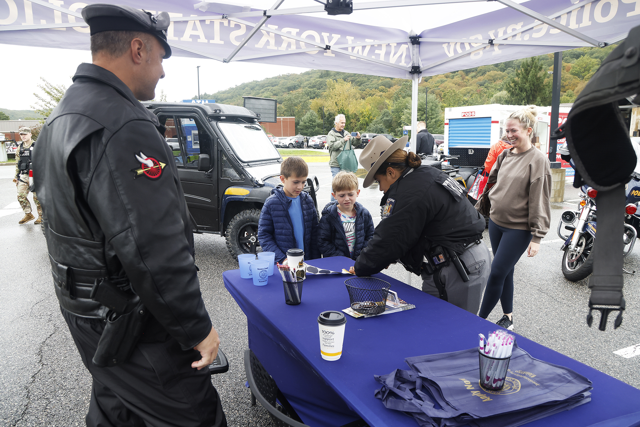 A few hundred West Point community members braved the chilly, inclement weather as the Directorate of Plans, Training, Mobilization and Security hosted the annual Emergency Preparedness Fair Sept. 30 at the West Point Post Exchange parking lot.   (Photo by Eric S. Bartelt/PV)