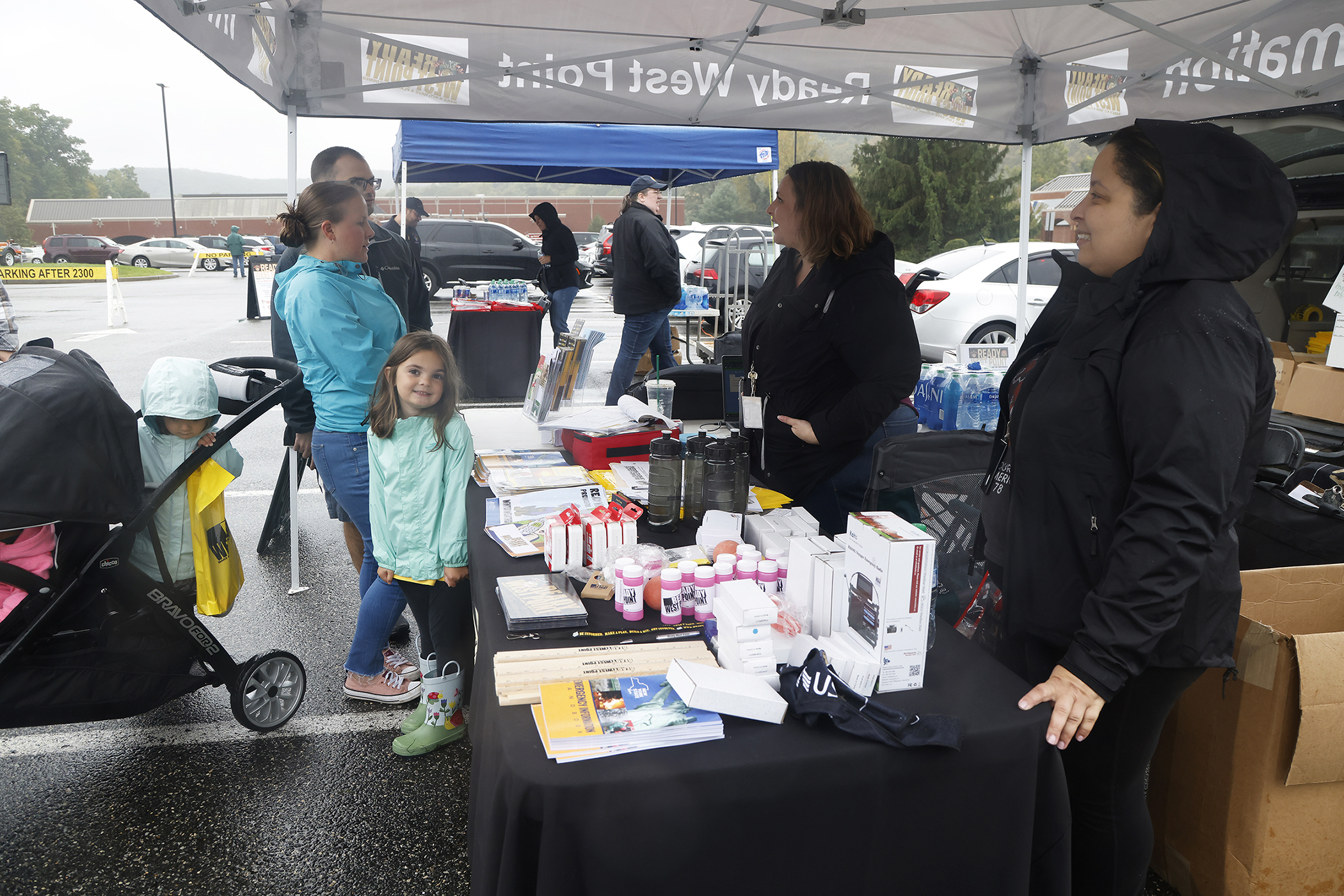 A few hundred West Point community members braved the chilly, inclement weather as the Directorate of Plans, Training, Mobilization and Security hosted the annual Emergency Preparedness Fair Sept. 30 at the West Point Post Exchange parking lot.   (Photo by Eric S. Bartelt/PV)