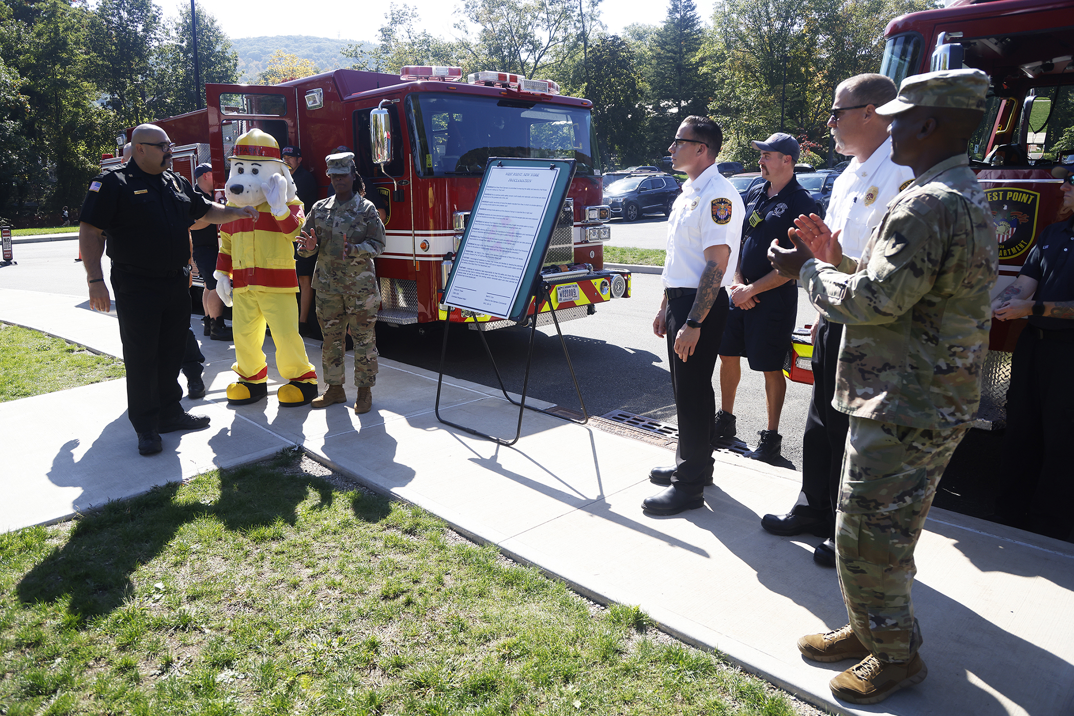 With a commitment to ensuring the safety and security of those living, working and visiting West Point, U.S. Army Garrison West Point and the West Point Fire Department (WPFD) teamed up for a Fire Prevention Week Proclamation signing Oct. 4 at the West Point Middle School (WPMS).    (Photo by Eric S. Bartelt/PV)