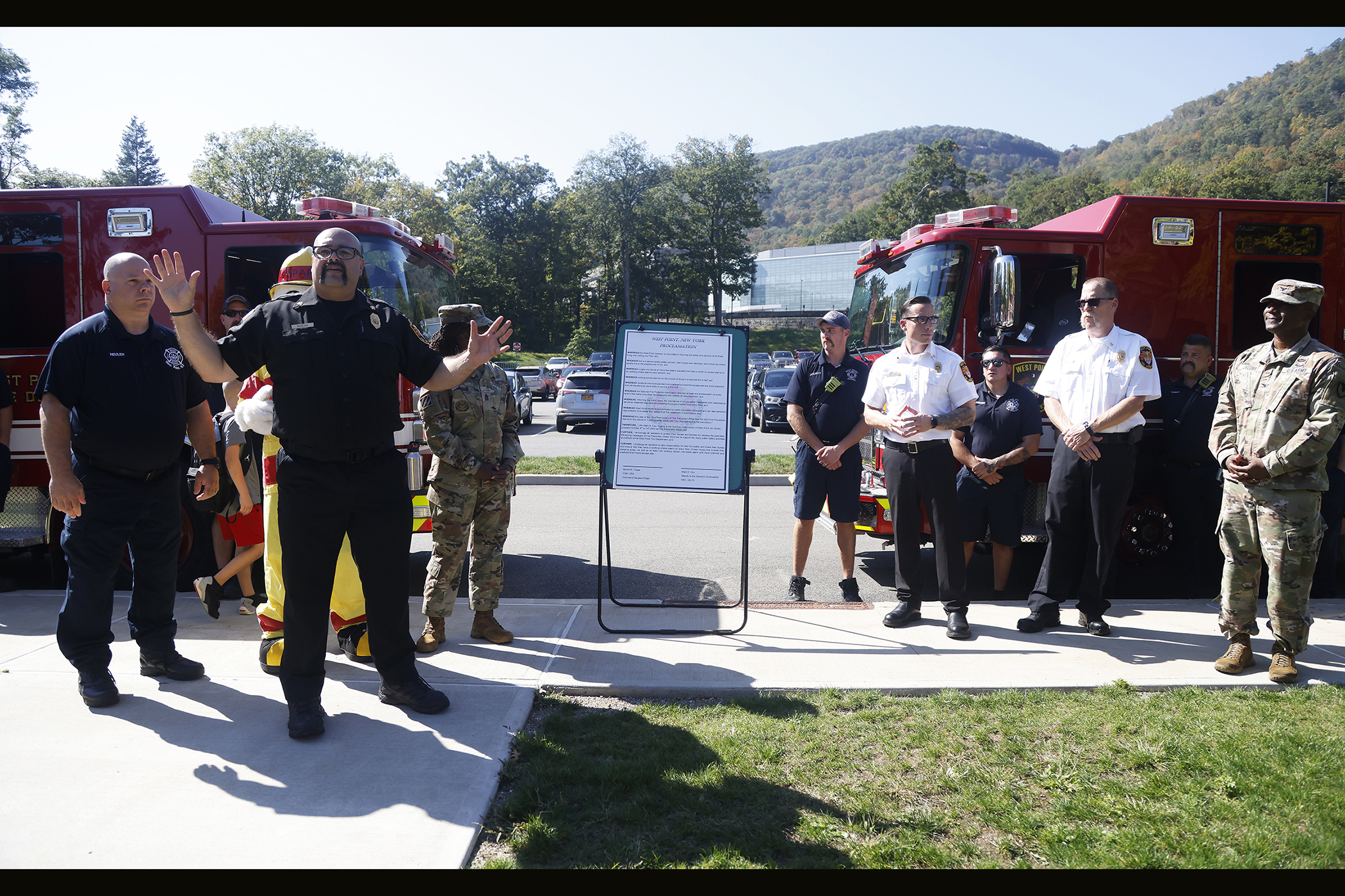 With a commitment to ensuring the safety and security of those living, working and visiting West Point, U.S. Army Garrison West Point and the West Point Fire Department (WPFD) teamed up for a Fire Prevention Week Proclamation signing Oct. 4 at the West Point Middle School (WPMS).    (Photo by Eric S. Bartelt/PV)