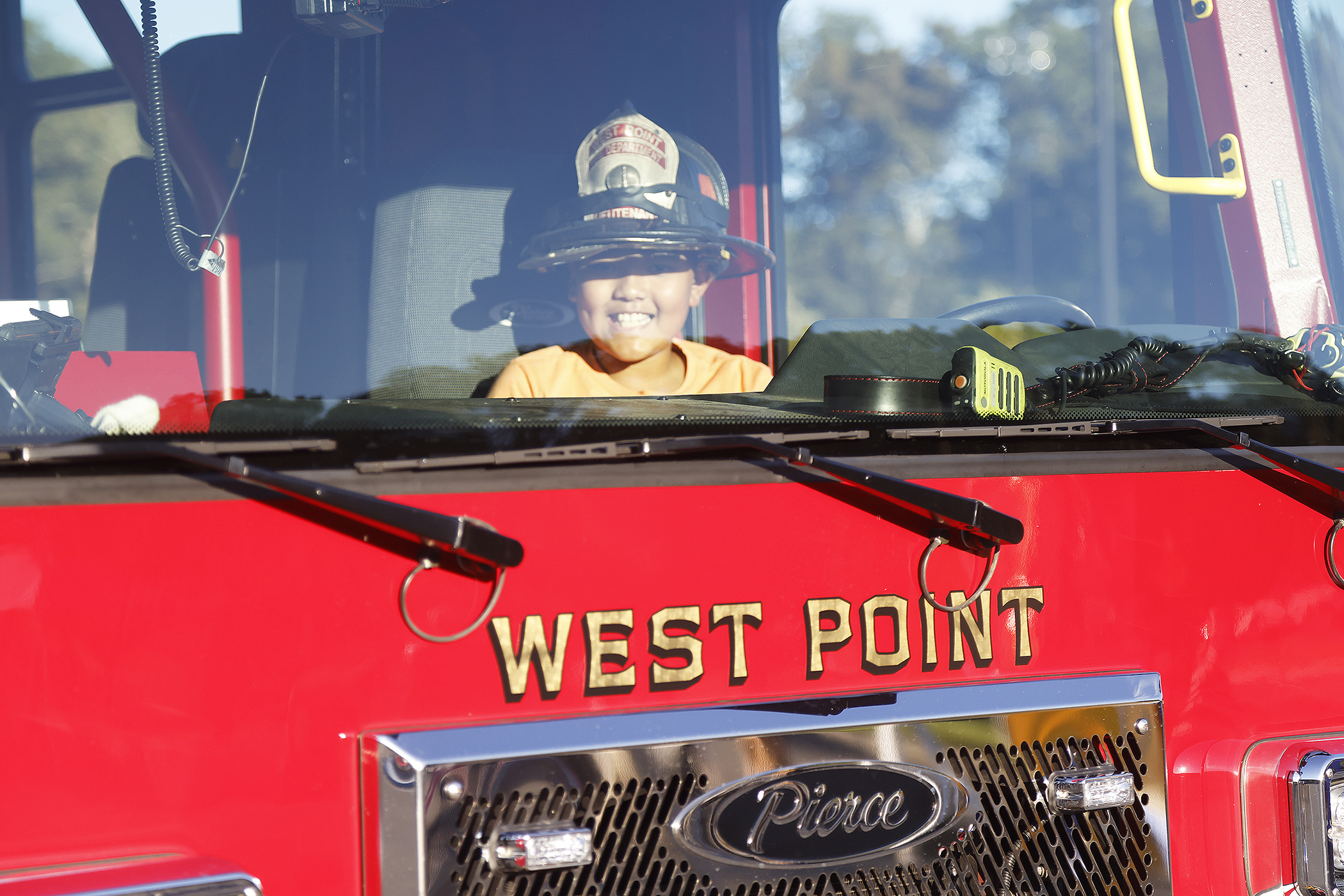 The West Point Fire Department (WPFD) presented its annual Open House for the West Point community Oct. 11 at H Lot in the Post Exchange parking lot. The WPFD offered activities to the children including the Kids Firefighting Obstacle Course with firefighting gear, Fire Extinguisher Training, Bounce House, Fire Truck displays, Cornhole, Dunk a Firefighter and the announcement of the Fire Prevention Week Poster Contest winners.   (Photo by Eric S. Bartelt/PV)