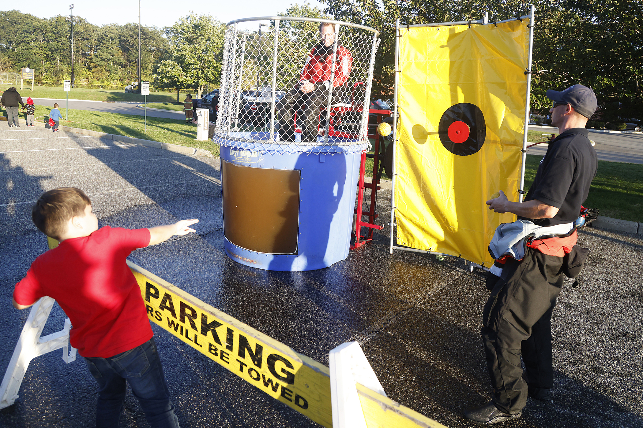 The West Point Fire Department (WPFD) presented its annual Open House for the West Point community Oct. 11 at H Lot in the Post Exchange parking lot. The WPFD offered activities to the children including the Kids Firefighting Obstacle Course with firefighting gear, Fire Extinguisher Training, Bounce House, Fire Truck displays, Cornhole, Dunk a Firefighter and the announcement of the Fire Prevention Week Poster Contest winners.   (Photo by Eric S. Bartelt/PV)