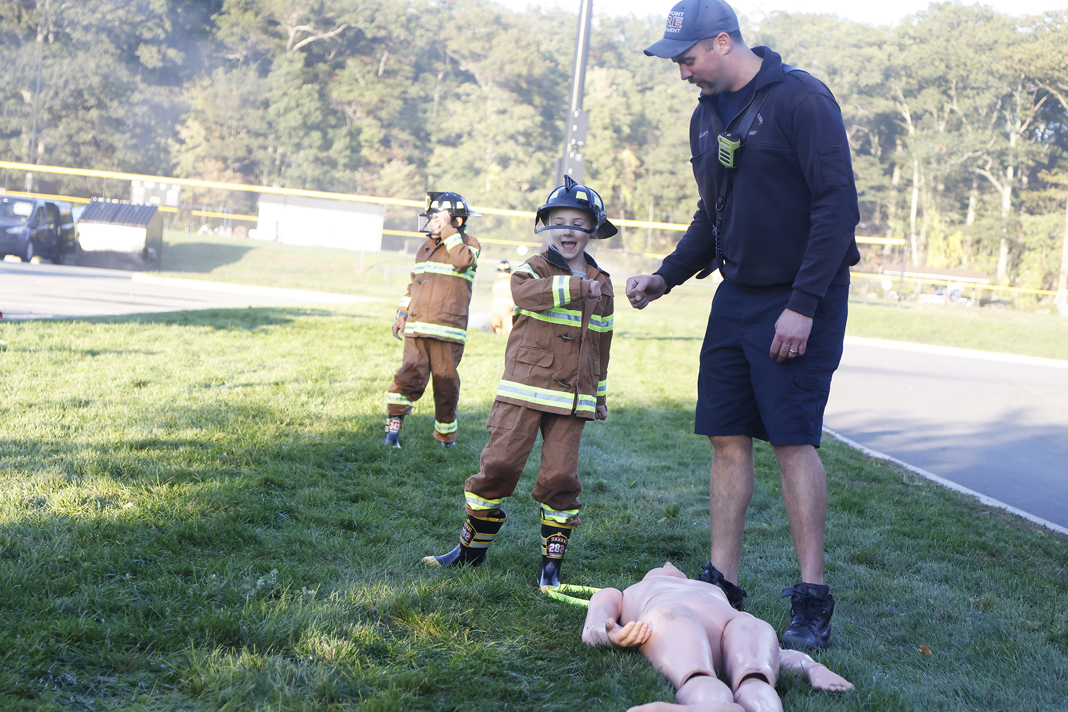 The West Point Fire Department (WPFD) presented its annual Open House for the West Point community Oct. 11 at H Lot in the Post Exchange parking lot. The WPFD offered activities to the children including the Kids Firefighting Obstacle Course with firefighting gear, Fire Extinguisher Training, Bounce House, Fire Truck displays, Cornhole, Dunk a Firefighter and the announcement of the Fire Prevention Week Poster Contest winners.   (Photo by Eric S. Bartelt/PV)