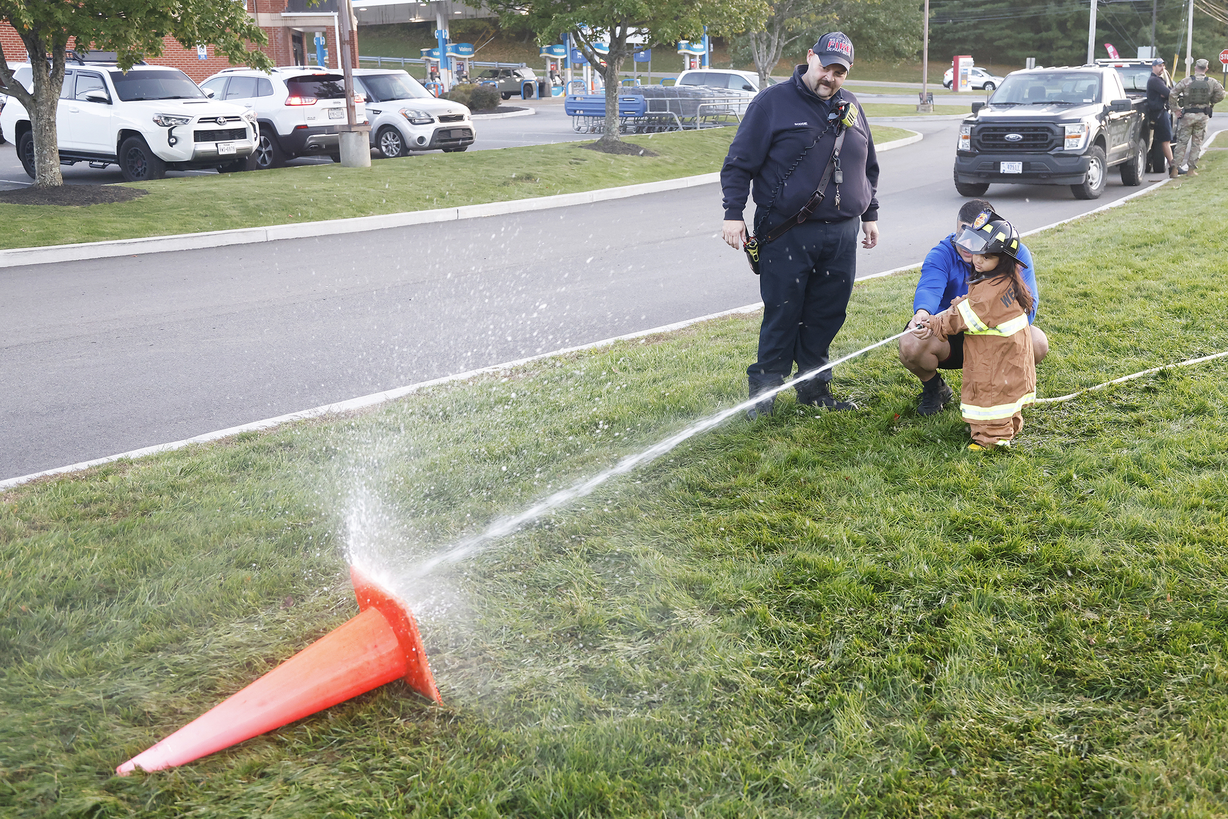 The West Point Fire Department (WPFD) presented its annual Open House for the West Point community Oct. 11 at H Lot in the Post Exchange parking lot. The WPFD offered activities to the children including the Kids Firefighting Obstacle Course with firefighting gear, Fire Extinguisher Training, Bounce House, Fire Truck displays, Cornhole, Dunk a Firefighter and the announcement of the Fire Prevention Week Poster Contest winners.   (Photo by Eric S. Bartelt/PV)