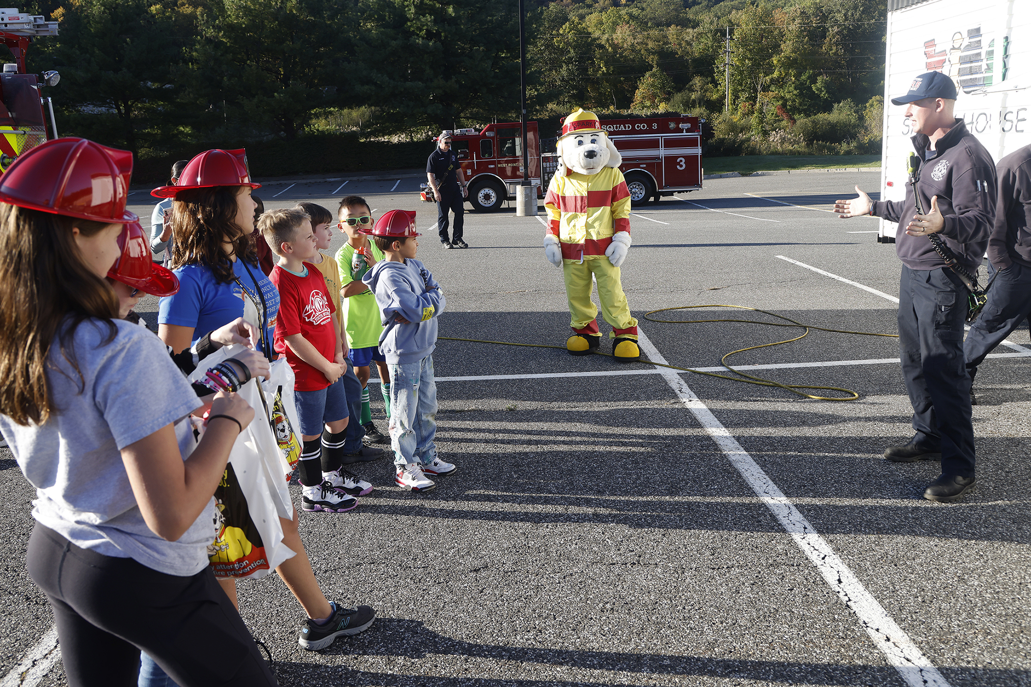 The West Point Fire Department (WPFD) presented its annual Open House for the West Point community Oct. 11 at H Lot in the Post Exchange parking lot. The WPFD offered activities to the children including the Kids Firefighting Obstacle Course with firefighting gear, Fire Extinguisher Training, Bounce House, Fire Truck displays, Cornhole, Dunk a Firefighter and the announcement of the Fire Prevention Week Poster Contest winners.   (Photo by Eric S. Bartelt/PV)
