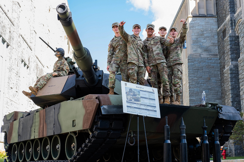 Aviation (above), Quartermaster (left) and Armor (right) catch the attention of cadets as they observe the displays during Branch Week Sept. 8 in Central Area. Branch Week, Sept. 6-9, is an annual event designed to give cadets a chance to learn more about the 17 U.S. Army branches available to officers. Cadets from each class year spoke with representatives to help them decide which branch best fits them for a professional career.      Photos by Class of 2023 Cadet Jachin Bales