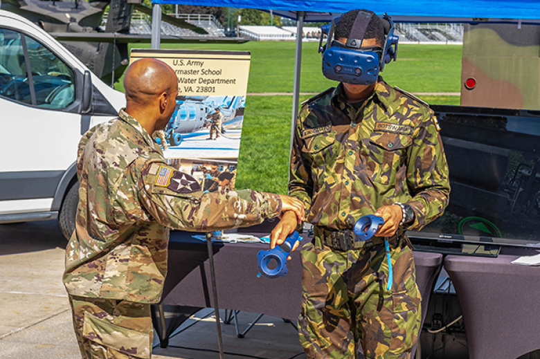 Aviation (above), Quartermaster (left) and Armor (right) catch the attention of cadets as they observe the displays during Branch Week Sept. 8 in Central Area. Branch Week, Sept. 6-9, is an annual event designed to give cadets a chance to learn more about the 17 U.S. Army branches available to officers. Cadets from each class year spoke with representatives to help them decide which branch best fits them for a professional career.      Photos by Class of 2023 Cadet Jachin Bales