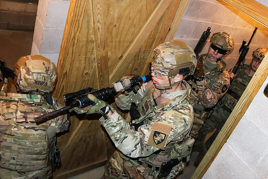 Cadets execute their close quarters strategy in the target building 