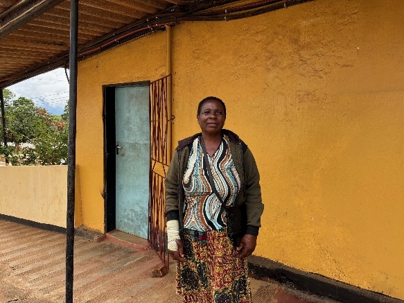 Shelly Mainza outside her home