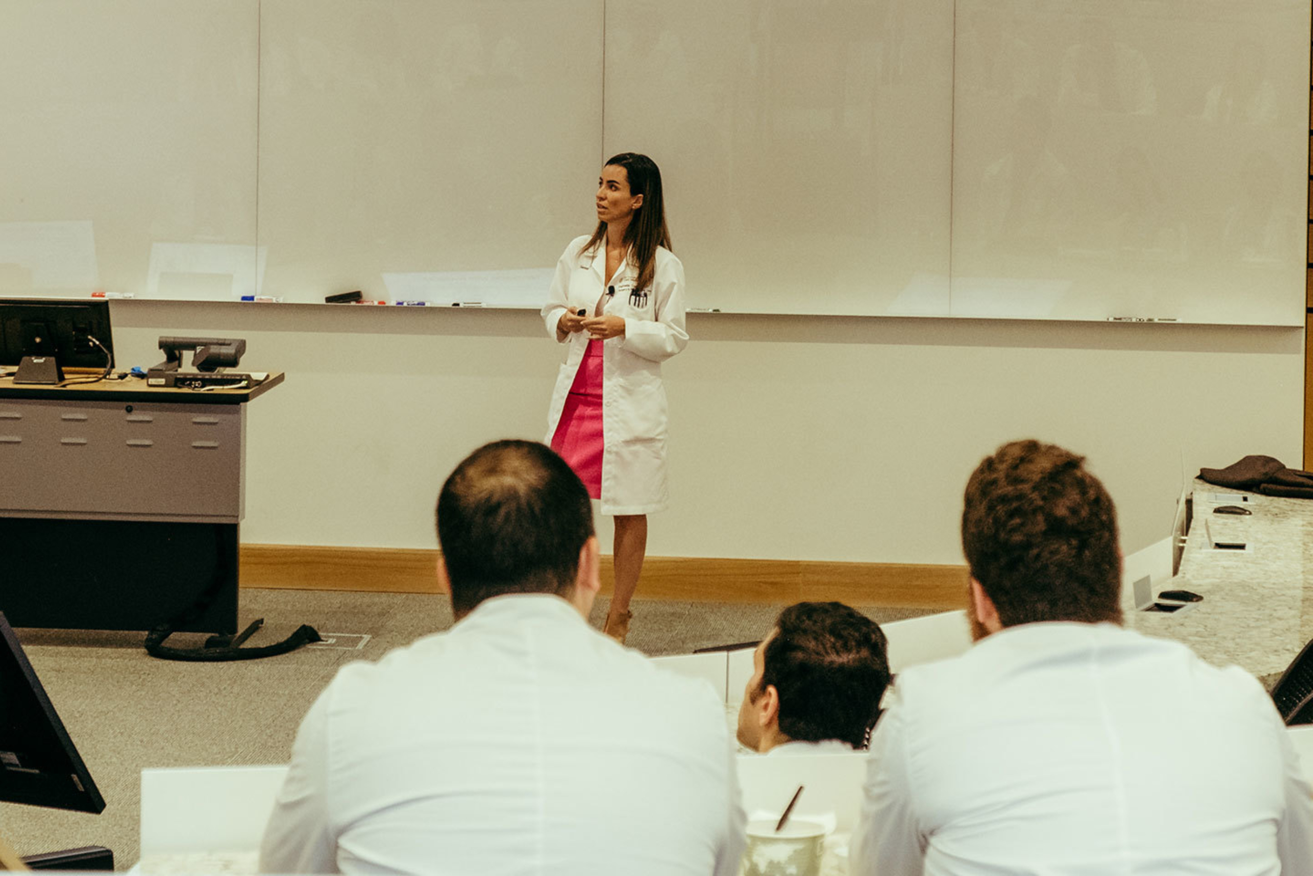 A professor teaching a class.