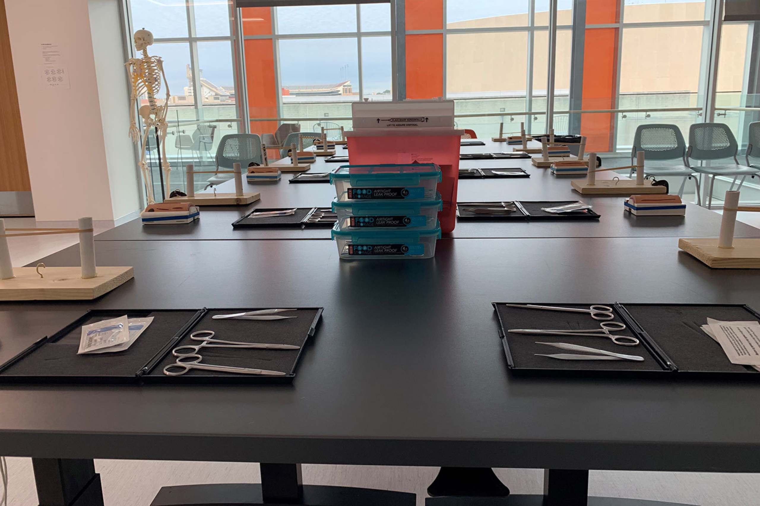A lab table with surgery instruments on it.