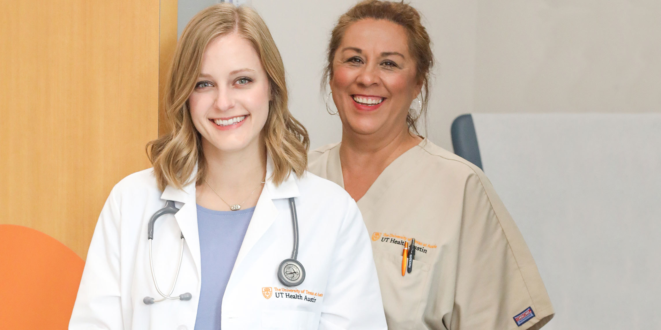 Doctor and nurse smiling