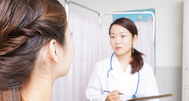 Forensic nurse with patient