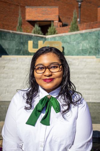 Current MS MIS student Taylor Witt standing in front of UAB