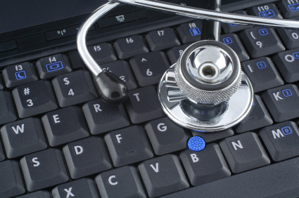 Stethoscope on computer keyboard