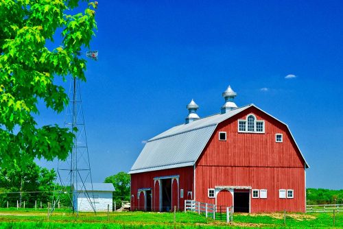Traditional barn painted in red in midwest rural community