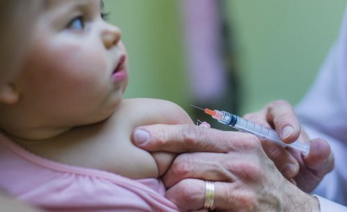 Infant getting medical help
