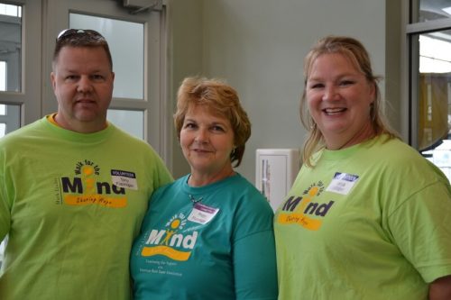 Flannigan with two volunteers in 2011