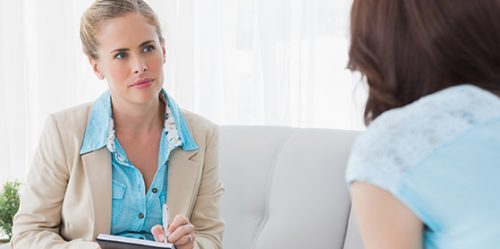 Counselor working with patient