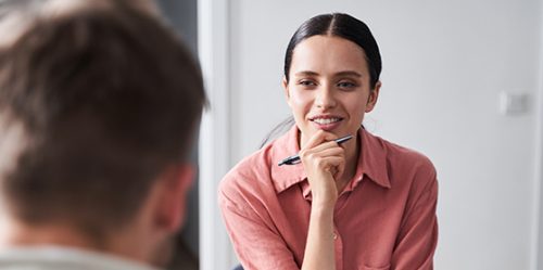 Young woman counsels man
